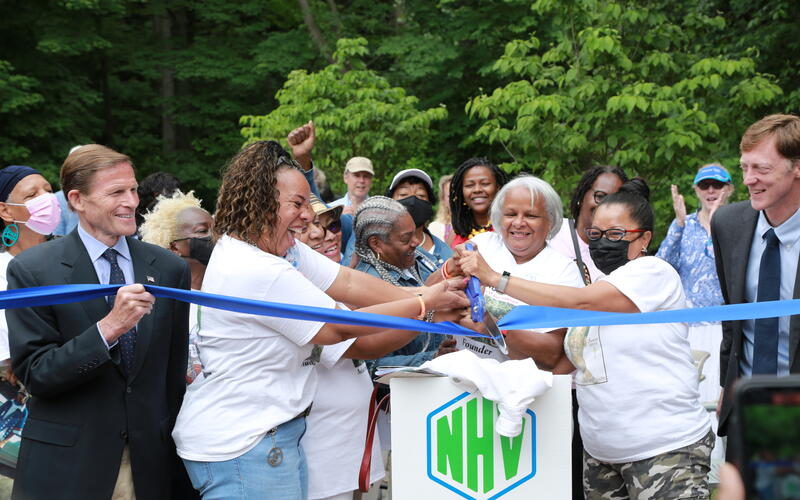 ribbon cutting ceremony with the moms and community leaders