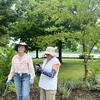 Christel and Joyce identifying a fitch on a tree!