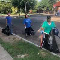 Three cleanup volunteers